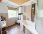 Badezimmer - Ankommen. Durchatmen | Bungalow mit 4 Zimmer u. 110qm2 Wohnfläche | Naturparadies mitten in Hamburg.