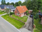 Hausbild 1 - Ländliches Kleinod mit Potenzial, Charmantes Einfamilienhaus – Ländliches Idyll in Meeresnähe.