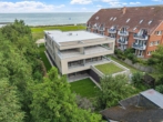 Rückansicht Meer - Exkl. 2 – Zimmerwhg. mit Terrasse u. Garten. Wohnen in der ersten Reihe am Schönberger Strand.