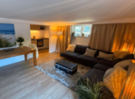 Souterrain Wohnzimmer - Dein Leben – immer im Urlaub: Exklusives Ostsee-Domizil über 2 Ebenen mit 7 Zimmern in Premium-LAGE.