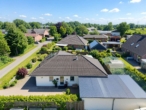 Außenansicht - Modern-Innovativ–Stilvoll. Gepflegter Bungalow mit großem Wintergarten. Ein Zuhause zum Wohlfühlen.