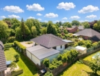 Rückansicht - Modern-Innovativ–Stilvoll. Gepflegter Bungalow mit großem Wintergarten. Ein Zuhause zum Wohlfühlen.