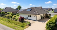 Ihr neues Zuhause in Nordfries - Modern-Innovativ–Stilvoll. Gepflegter Bungalow mit großem Wintergarten. Ein Zuhause zum Wohlfühlen.