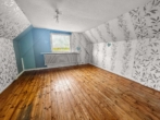 DG.-Schlafzimmer-1 - Ihr Projekt, Ihr Zuhause: Charmantes EFH. mit großem Grundstück in ruhiger Lage von Brunsbüttel.