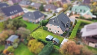 Ausßenansicht Rückseite - SCHMUCKSTÜCK! Charmante 3-Zi.-Wohnung in ruhiger Lage in Weddingstedt.