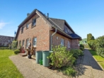Außenansicht-Rückseite - SCHMUCKSTÜCK! Charmante 3-Zi.-Wohnung in ruhiger Lage in Weddingstedt.