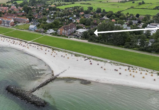 Exzellente Strandlage - Penthouse-Feeling pur – 3-Zimmerwhg. mit zwei Terrassen, direktem Meerblick am Schönberger Strand.